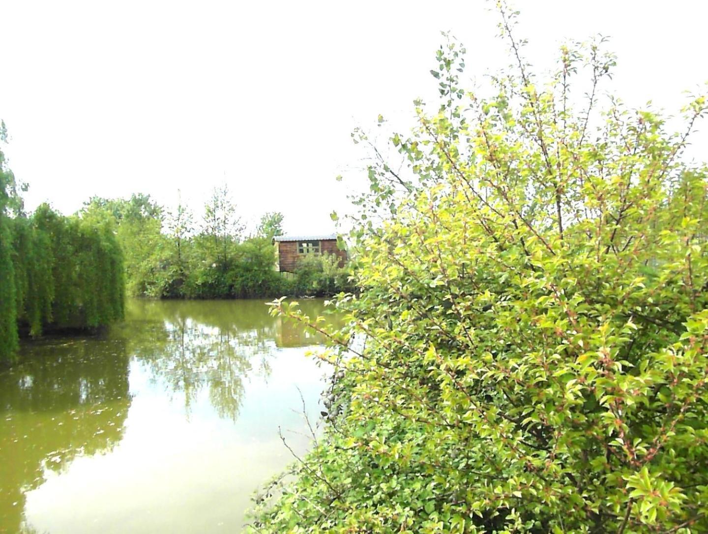 Casetta Sul Lago Albairate Bagian luar foto